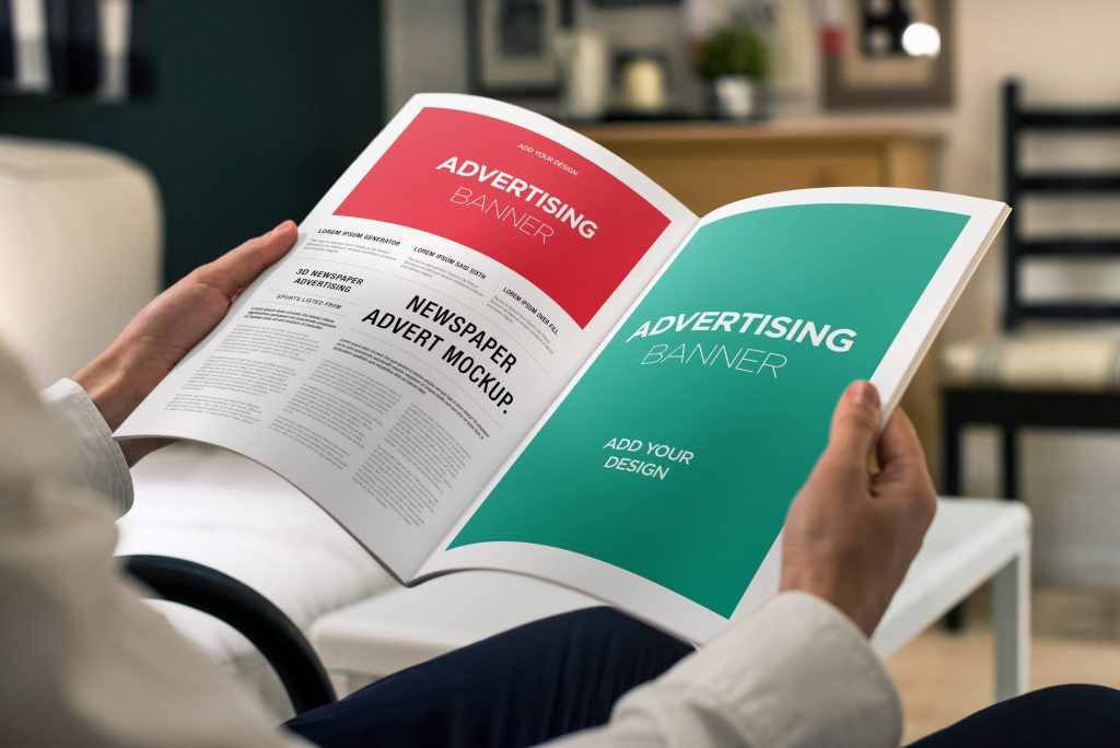 advertising,banner,on,magazine,,brochure,mockup,with,hands